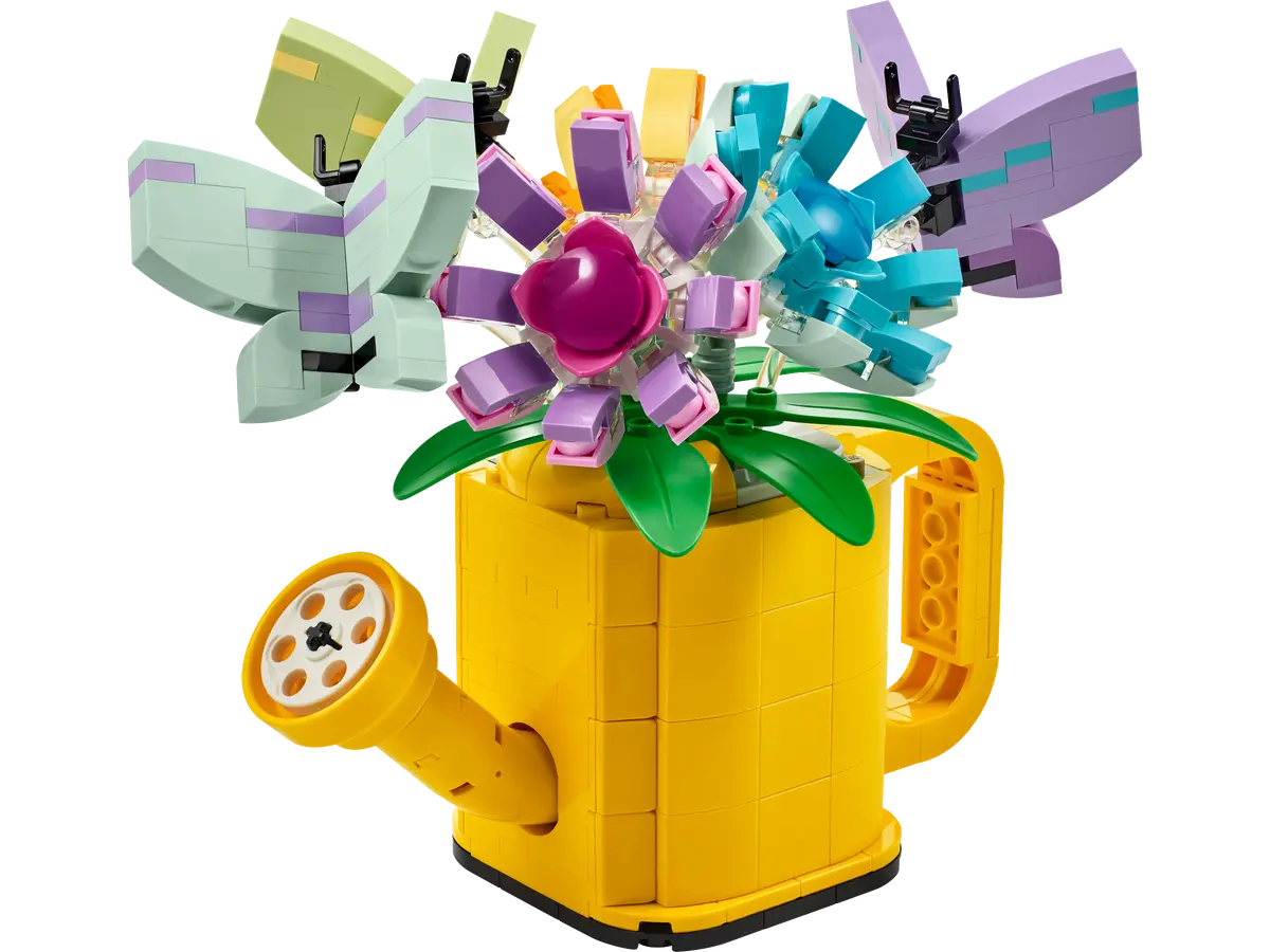 Gießkanne mit Blumen Gießkanne mit Blumen
